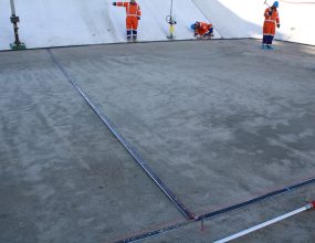 Preparing joint placement in the SandSealms® secondary confinement system.